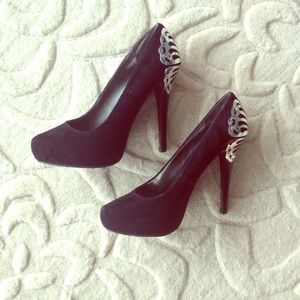 Black Carlos Santana heels with silver detail