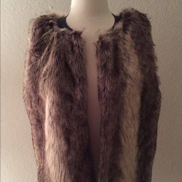 Faux-Fur vest with Faux leather trim