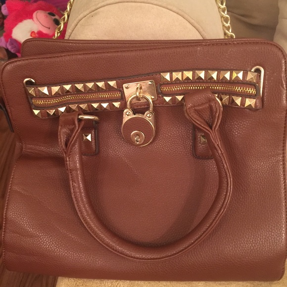 Brand new brown with gold hardware handbag