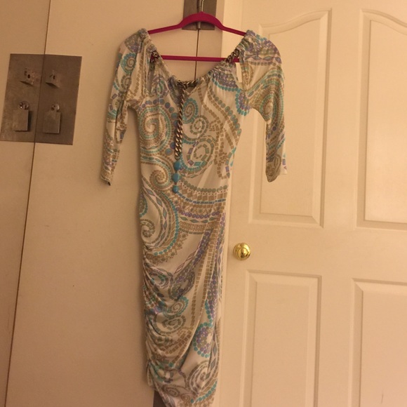 A tribal patterned dress with a light mermaid tail