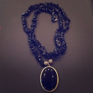 Double twist necklace with pendant