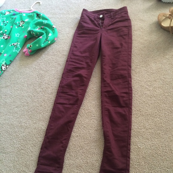 High waisted maroon jeans