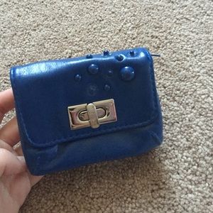 Blue button decorated wallet