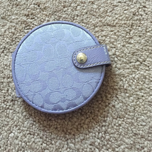 Purple coach mirror