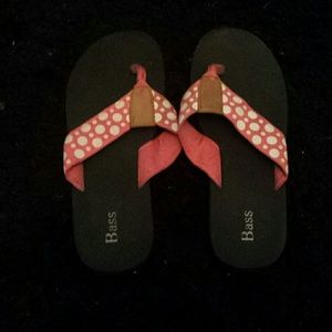 Pink polka dot flip flops