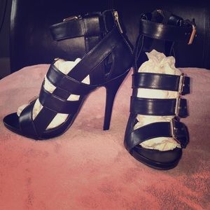Black buckled heels