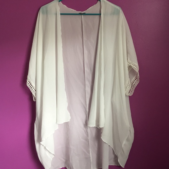 White Kimono with crochet detailing on sleeves.