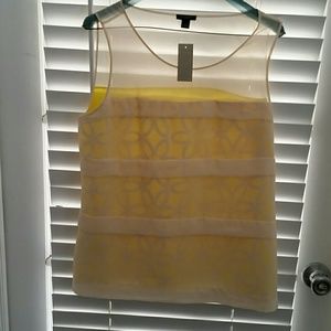 Sheer top with yellow for all underneath
