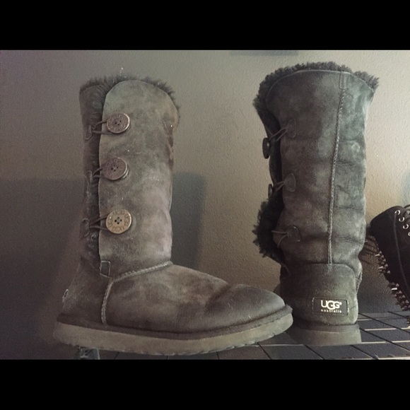 Black uggs with buttons on the side