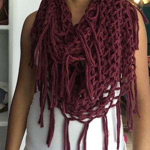 Burgundy knit infinity scarf.