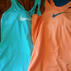 Nike tanks and shirt $20 a piece