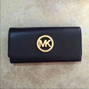 SOLD MK black flap continental NEW