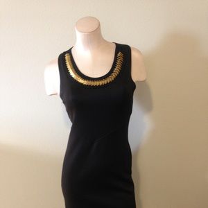 Black Cocktail Dress with Gold Neckline