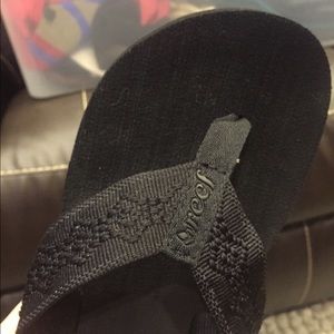 Womens Reef flip flops size 8, never worn