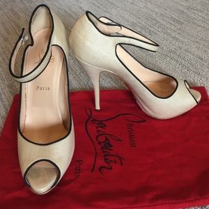 Christian Louboutin cream pump with black piping