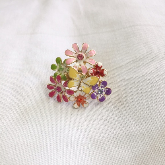 Flower and butterfly ring