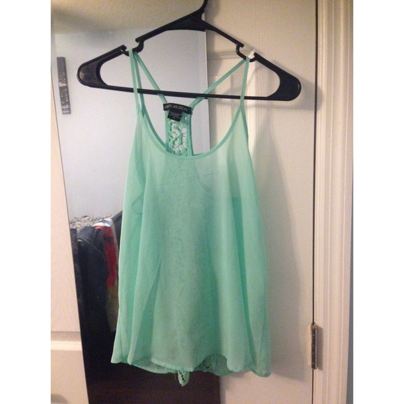 Light Tiffany blue sheer shirt.