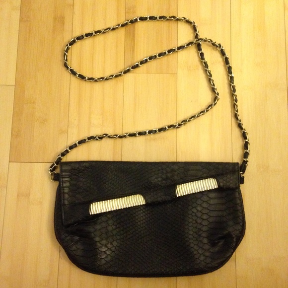 Black purse with gold detail