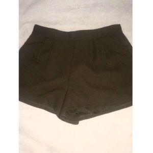 Hunter green high waist shorts.