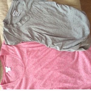 2 maternity shirts. One medium one small