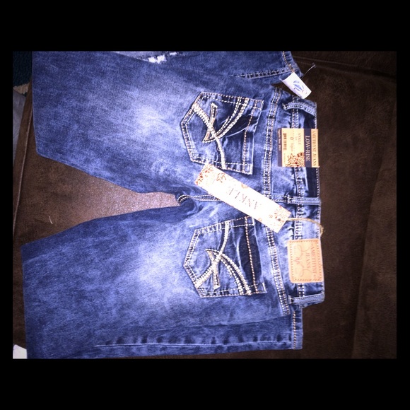 Amethyst distressed ankle jeans.  NWT