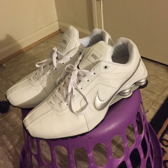 White and silver Nike shox