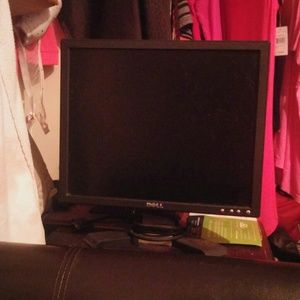 Dell computer monitor  and tower with key board