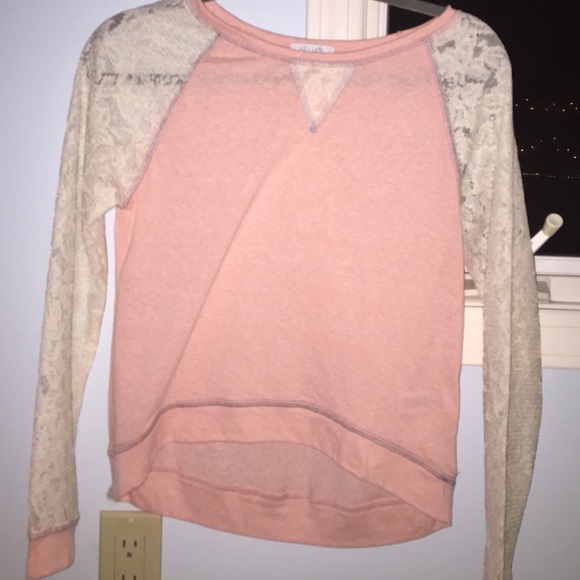 Delia's pink sweater with lace sleeves