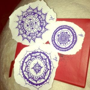 Henna-type patterns on paper.