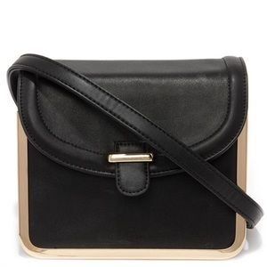 Chic black and gold crossbody purse