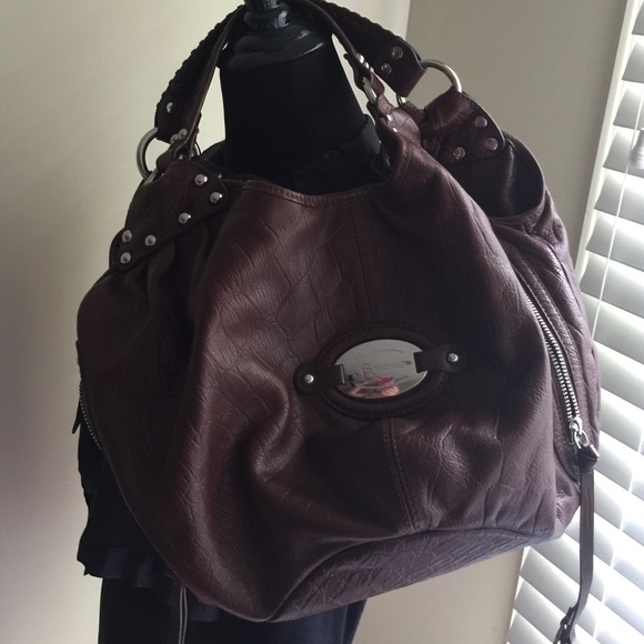 Large leather B Makowsky brown handbag.