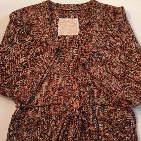 Short cardigan comes with the turtle neck...
