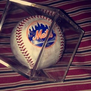 Autographed baseball by the mets