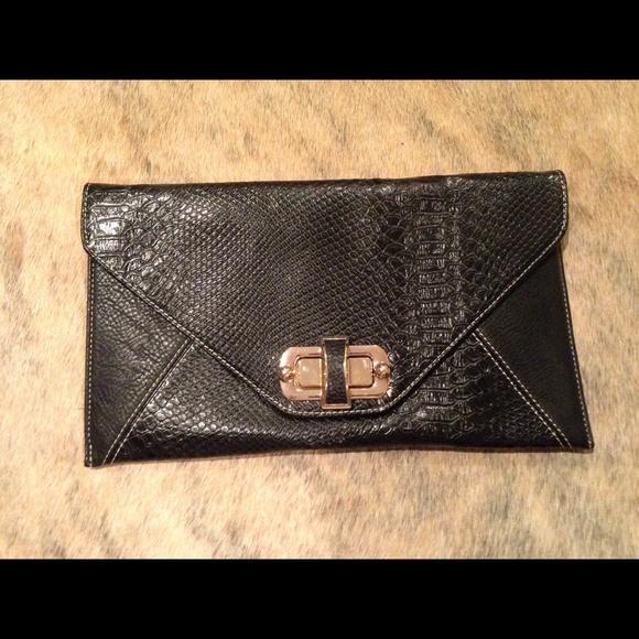Black snake skin clutch with gold latch