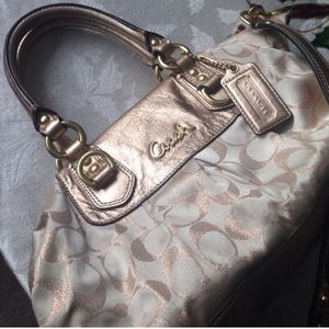 COACH gold/signature handbag