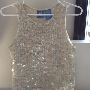 White sleeveless knit top with sparkles