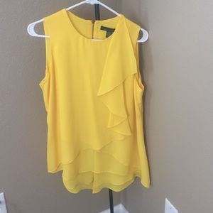 Yellow sleeveless tunic top