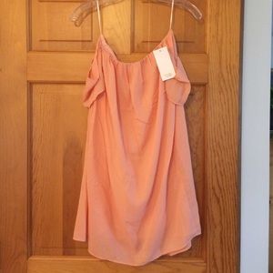 Tobi peach showing off dress✨