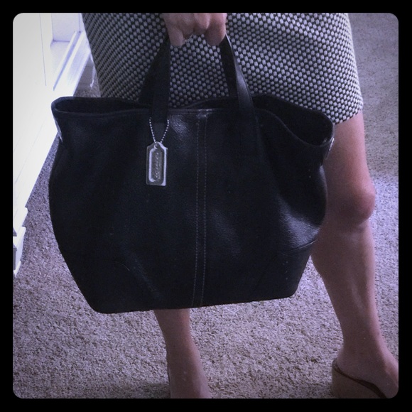 Authentic Coach Black leather convertible purse.