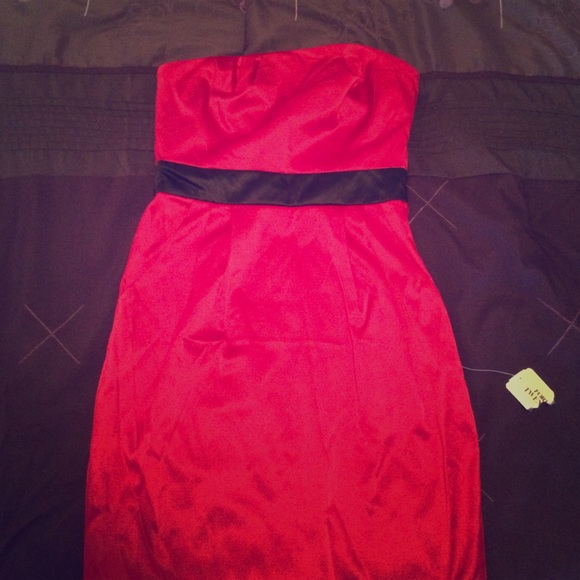 Red cocktail dress with black accent
