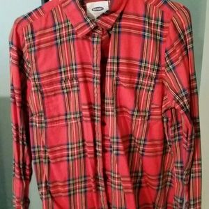 Red flannel long sleeved button up shirt.