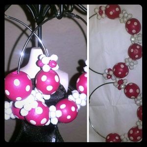 Beautiful hand-crafted pink and white hoops.