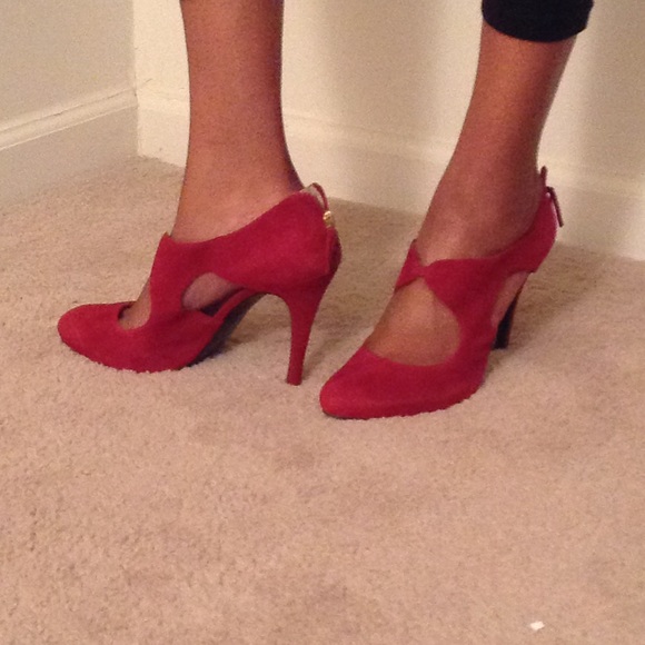 Red suede pumps