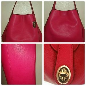 ** Sold locally**Pink Ruby Coach Purse & Wallet