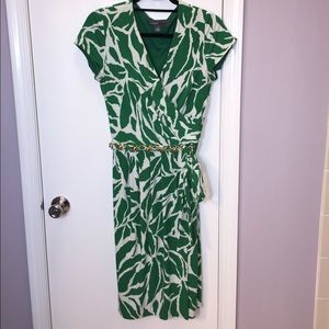 White and green wrap dress with gold