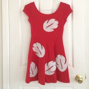 A homemade Lilo dress with white felt leaves