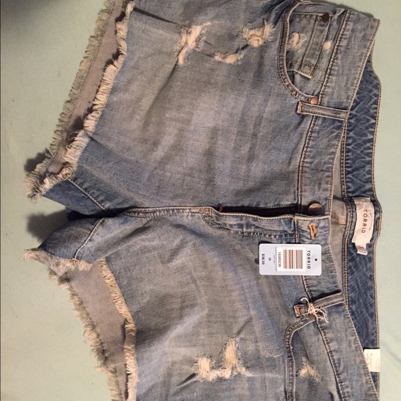 Brand new torrid distructed jean shorts!