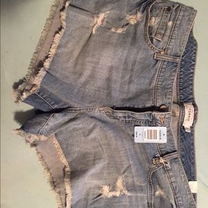 Brand new torrid distructed jean shorts!