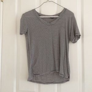 A black and white stripped tee shirt