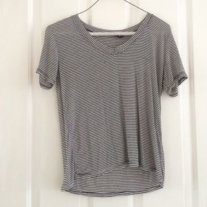 A black and white stripped tee shirt